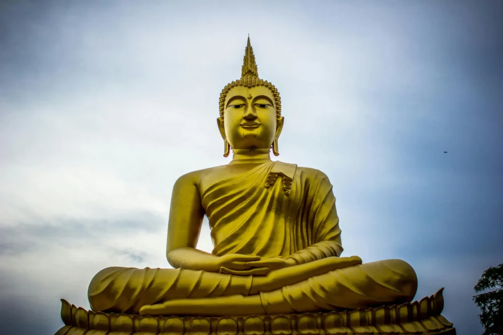 statue in 
Bangkok, Thailand- Places to Travel to from Northern Ireland