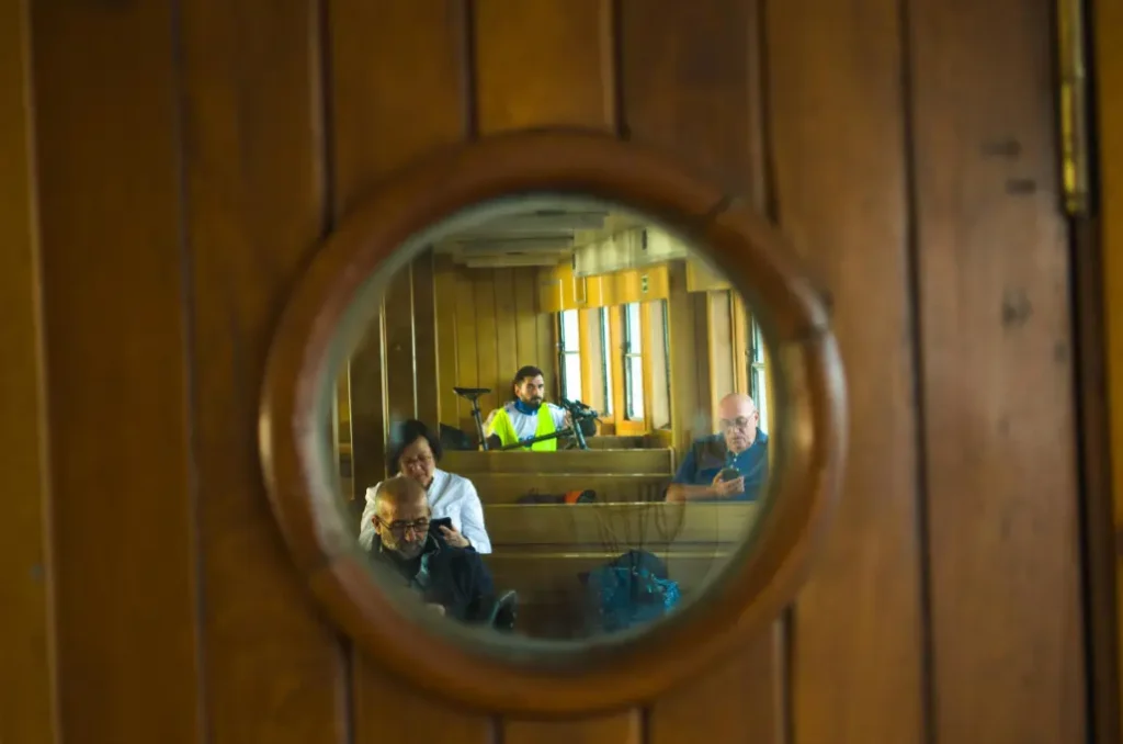 a cruise inside cabin with round glass window